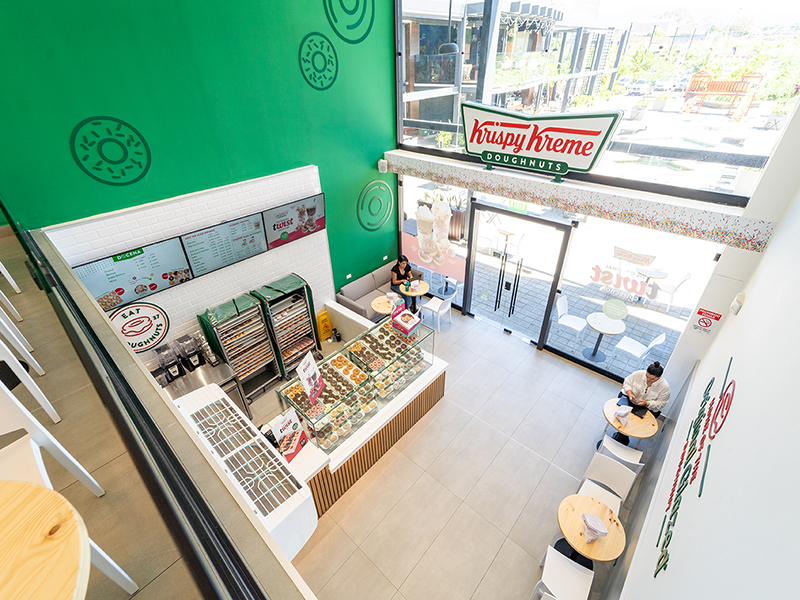 Krispy Kreme - High-angle view of retail counter layout and donut display cases - Contract Workplaces.jpg